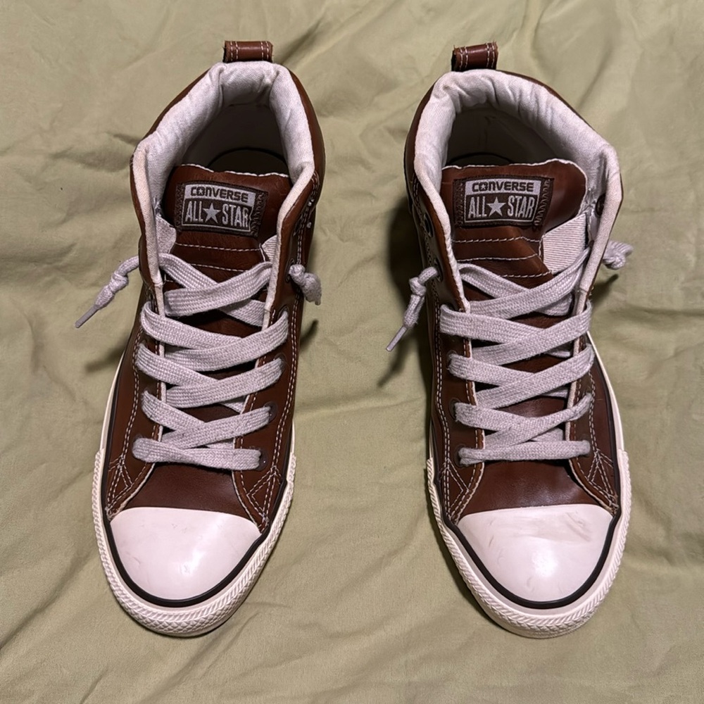 Brown leather converse high tops